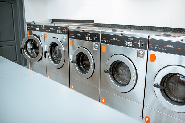 what are the key factors to consider when selecting a supplier for commercial laundry equipment?